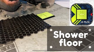 Shower floor installation penny rounds with a flofx height adjustment system [upl. by Aitnecserc795]