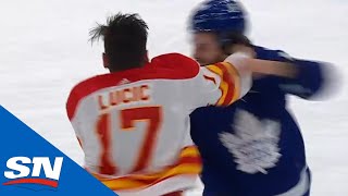 Milan Lucic Celebrates 1000th Game With Fight Against Scott Sabourin [upl. by Herm]