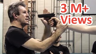 KRAV MAGA TRAINING • The Fastest gun disarm Tutorial [upl. by Nytsrik]