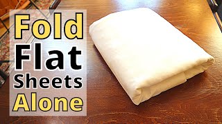 How to Fold Flat Sheets ALONE and Save Space [upl. by Lapo]