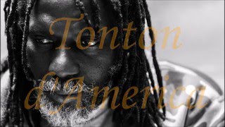 Tiken Jah Fakoly  Tonton dAmerica  Lyrics [upl. by Jammal]