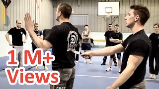 KRAV MAGA TRAINING • How to disarm a knife in your back [upl. by Eladnar713]