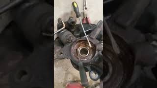 Rusted Wheelbearing retainer clip removal 20012003 prius [upl. by Cosma58]