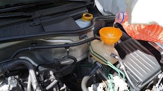 Opel Corsa  Engine Coolant Change [upl. by Yenterb]