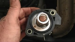 Replace the thermostat on a Dodge Grand Caravan [upl. by Annoif]