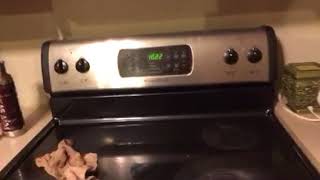 How To Set The Clock On A Frigidaire Stove [upl. by Barimah584]