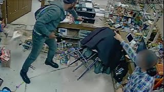 LiveLeak  Store clerk shot in robbery [upl. by Amliw794]