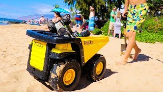 Dump Trucks Make Monster Truck Ramp at the Beach [upl. by Assital319]