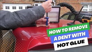 How To Remove A Dent With Hot Glue  Paintless Dent Removal [upl. by Ronyam]