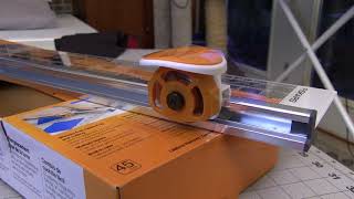 How to Use Fiskars SureCut Deluxe Paper Trimmer [upl. by Meggs795]