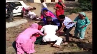 Rewari Haryana Sarpanch beats two widows publicly over a construction work [upl. by Ahsikan274]