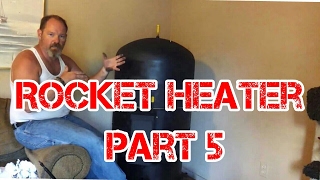 Rocket Heater Wood Stove Installation Part 5 The First Burn Indoors [upl. by Locklin]