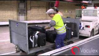 Unloadingloading Baggage between Open Carts and Conveyors  using Vaculex TP BaggageLift [upl. by Modestine]