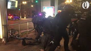 A protester punched a Portland police officer Tuesday night [upl. by Kalie]