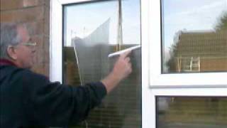 How to wash a window using a mop and squeegee [upl. by Ilegna316]