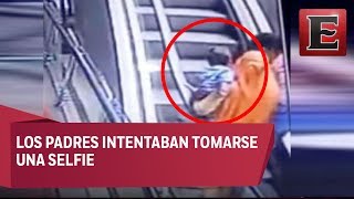 VIDEO Muere bebé tras aparatosa caída en escalera eléctrica [upl. by Lirbaj811]