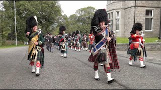 Massed Pipes and Drums of the Scottish Highlands line up ready for march to 2022 Braemar Gathering [upl. by Nileuqaj689]