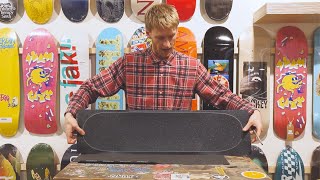 How To Grip Tape A Skateboard Deck PERFECTLY Slam City Skates [upl. by Chuah]