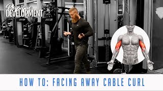 How to Facing Away Cable Biceps Curl  PhysiqueDevelopmentcom [upl. by Lenra]