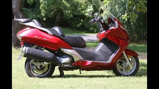 How to change the oil on a honda silverwing scooter [upl. by Ahsed]