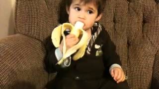 One year old baby eating banana [upl. by Yahsel]