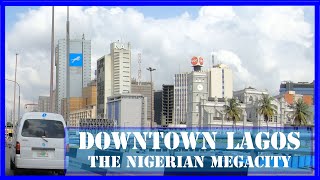 Downtown LAGOS NIGERIA  Discover the African megacity  From Balogun market to VI Ikoyi and Lekki [upl. by Saleme]