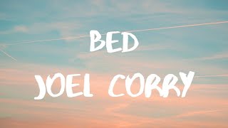 Joel Corry Raye David Guetta BED Lyrics I got a bed but id rather be in yours tonight [upl. by Tamera]