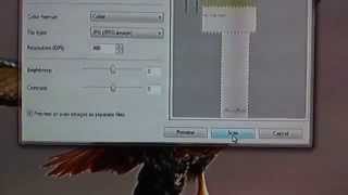 How to scan a document or photo in Windows 7 [upl. by Ahsaeit]