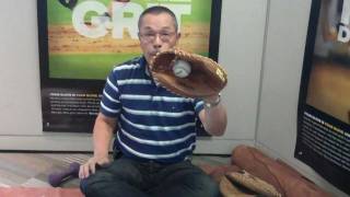 Wilson Baseball Aso Breaks in a Catchers Mitt [upl. by Wolsniw781]