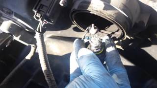 Changing headlight bulb on Ford Expedition [upl. by Anneirb195]