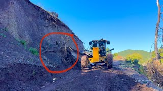 How John Deere 670 GP Grader Clears a Landslide on the Road grader johndeere [upl. by Anawad]