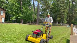 Aerating a yard with Stinger walk Behind Aerator [upl. by Mungo]