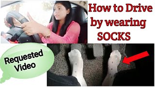 How to drive by wearing socks │Car driving with socks [upl. by Anaujait942]