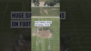 Huge sinkhole opens on football pitch [upl. by Tertius]