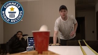 Most ping pong balls into a pint glass in one minute  Guinness World Records [upl. by Rigdon]