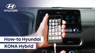 Hyundai KONA Hybrid telefoon koppelen en navigatie instellen [upl. by Abas]