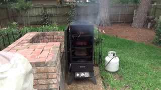 Smoked Barbecue Ribs on a Char broil vertical gas smoker [upl. by Anelram]