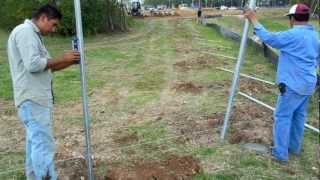 Setting Galvanized Fence Posts [upl. by Redyr]