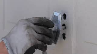 How to Replace a Garage Door Lock or Handle [upl. by Anoirtac]