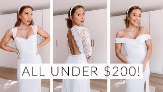 TRYING ON 5 WEDDING DRESSES UNDER 200  Lulus Bridal [upl. by Madelaine]