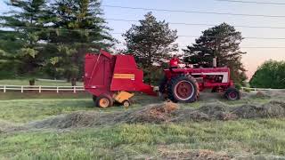 Farmall 706 and the 640 New Holland round baler 6172021 [upl. by Nylorak890]