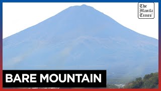 Japans Mount Fuji snowless for longest time on record [upl. by Nauwaj]