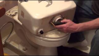 How to Replace a Toilet Flush Valve  Tank to Bowl Leak [upl. by Artema561]