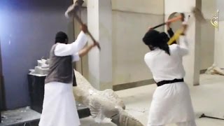 ISIS destroys ancient artifacts in Mosul [upl. by Enened447]