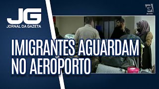 Centenas de imigrantes aguardam no aeroporto de Guarulhos liberação para entrar no Brasil [upl. by Letrice]