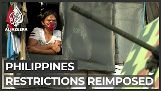 Philippines surge Restrictions reimposed in Manila [upl. by Jeroma173]