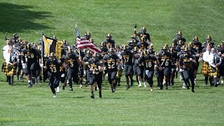 Defining Wooster Moment Bagpipers Lead Football Team Onto The Field [upl. by Tisdale34]