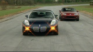 MotorWeek  Retro Review 06 Miata vs Solstice [upl. by Neyugn888]