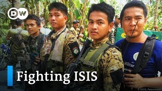 Philippines army and Muslim rebels join forces against ISIS  DW News [upl. by Naoh]