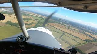 Approach and landing at Wellesbourne Mountford Airfield in a C42 microlight [upl. by Slemmer]